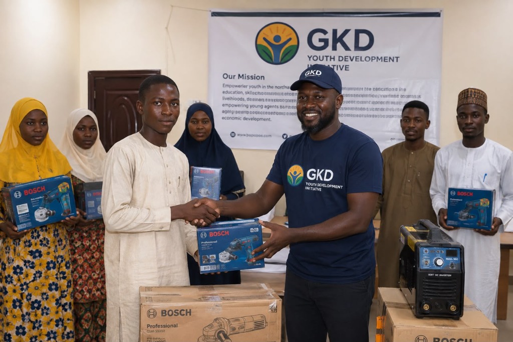 GKD Youth Development Initiative team and youth beneficiaries during a vocational equipment distribution ceremony in Northeast Nigeria