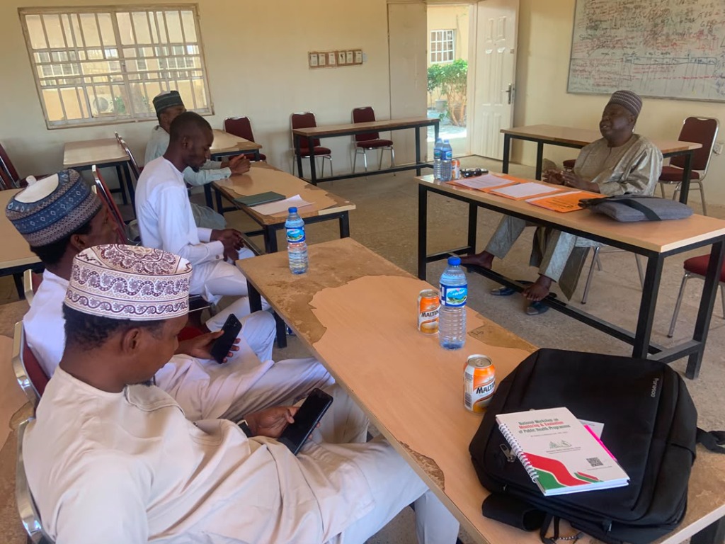 GKD-YDI leadership team reviewing strategic materials during the patron session